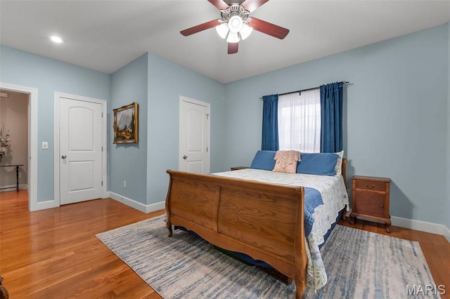 149 Windy Point Ave, Cape Girardeau, MO 63701 - bedroom with baseboards, wood finished floors, ceiling fan, and recessed lighting