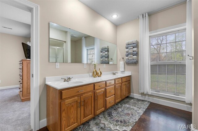 149 Windy Point Ave, Cape Girardeau, MO 63701 - bathroom with baseboards and double vanity