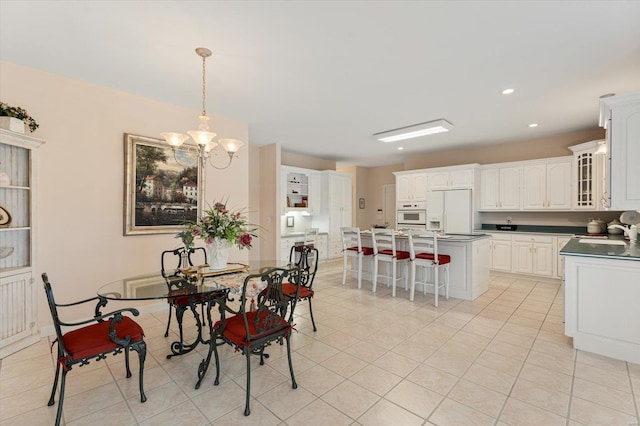 230 W Waters Edge Dr, Belleville, IL 62221 - dining space featuring a chandelier, light tile patterned floors, and recessed lighting
