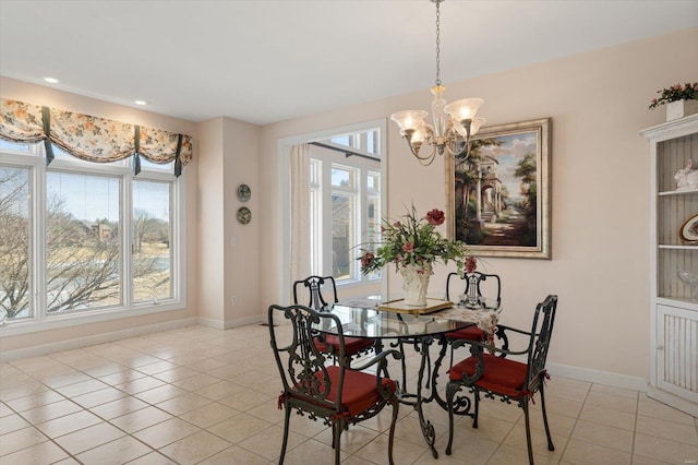 230 W Waters Edge Dr, Belleville, IL 62221 - dining area featuring a chandelier, light tile patterned flooring, and baseboards
