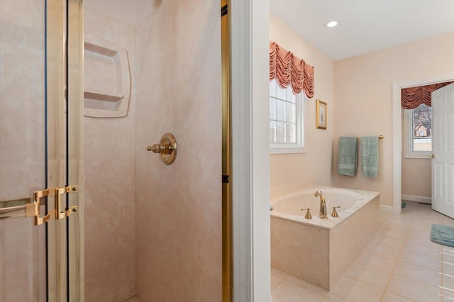230 W Waters Edge Dr, Belleville, IL 62221 - bathroom featuring a shower stall, a bath, plenty of natural light, and tile patterned flooring