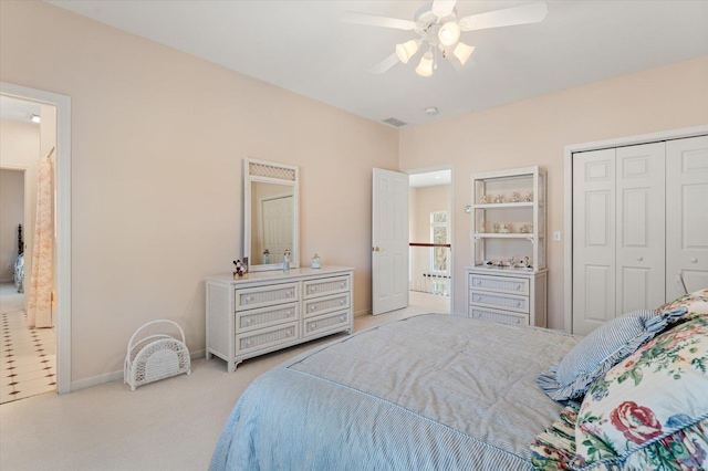 230 W Waters Edge Dr, Belleville, IL 62221 - carpeted bedroom featuring a closet, ceiling fan, and baseboards