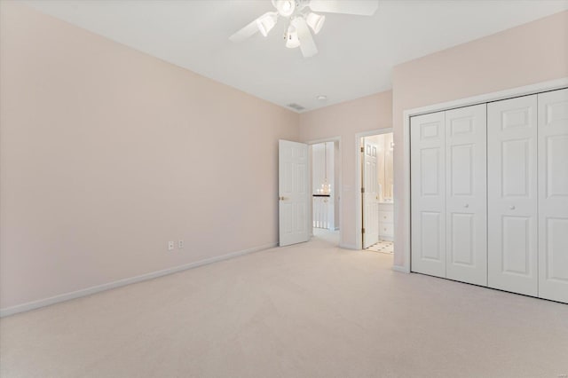 230 W Waters Edge Dr, Belleville, IL 62221 - unfurnished bedroom featuring carpet floors, baseboards, a closet, ensuite bathroom, and a ceiling fan