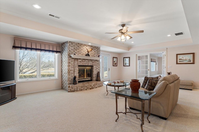 230 W Waters Edge Dr, Belleville, IL 62221 - carpeted living area with a ceiling fan, baseboards, a fireplace, crown molding, and recessed lighting