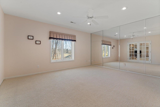 230 W Waters Edge Dr, Belleville, IL 62221 - empty room with a ceiling fan, recessed lighting, carpet flooring, baseboards, and french doors