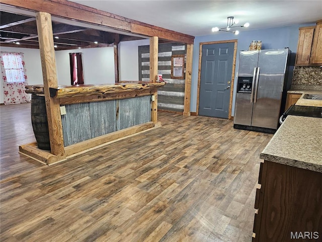 18480 State Route O, Rolla, MO 65401 - kitchen featuring stainless steel refrigerator with ice dispenser, wood finished floors, light countertops, and range with electric cooktop