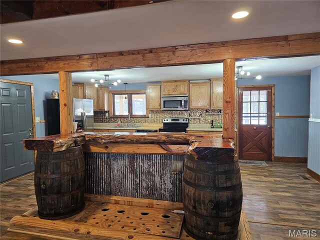 18480 State Route O, Rolla, MO 65401 - kitchen with stainless steel appliances, dark wood finished floors, a chandelier, plenty of natural light, and recessed lighting