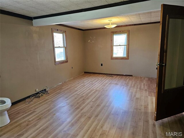 18480 State Route O, Rolla, MO 65401 - spare room with ornamental molding and wood finished floors