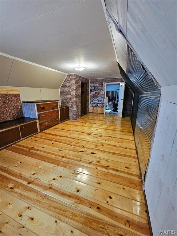 18480 State Route O, Rolla, MO 65401 - additional living space featuring hardwood / wood-style flooring and lofted ceiling