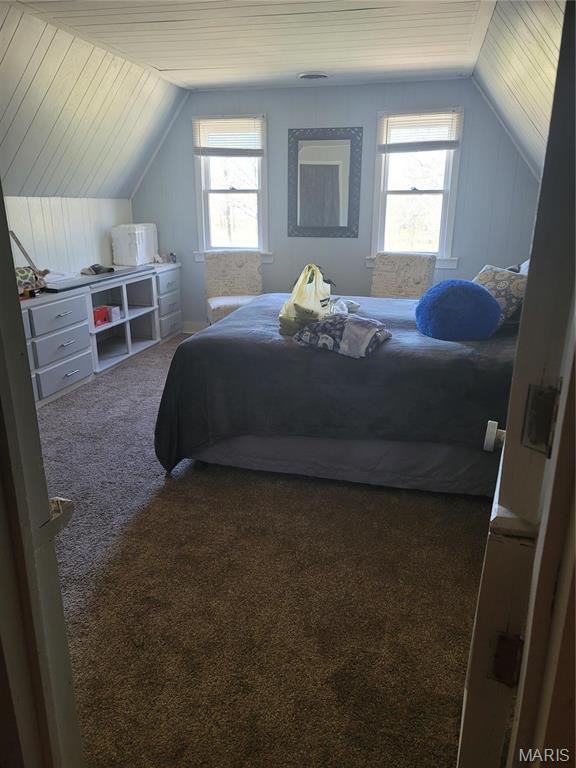 18480 State Route O, Rolla, MO 65401 - carpeted bedroom featuring lofted ceiling, multiple windows, and wood ceiling