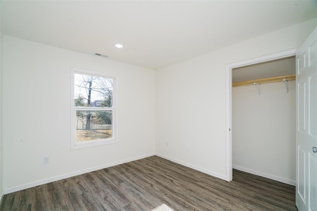 1510 N Mapleshade Rd, Cuba, MO 65453 - unfurnished bedroom featuring dark wood-style flooring, a closet, baseboards, and recessed lighting