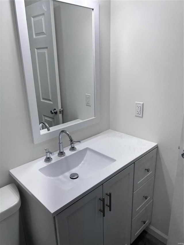 1510 N Mapleshade Rd, Cuba, MO 65453 - half bathroom featuring vanity and toilet