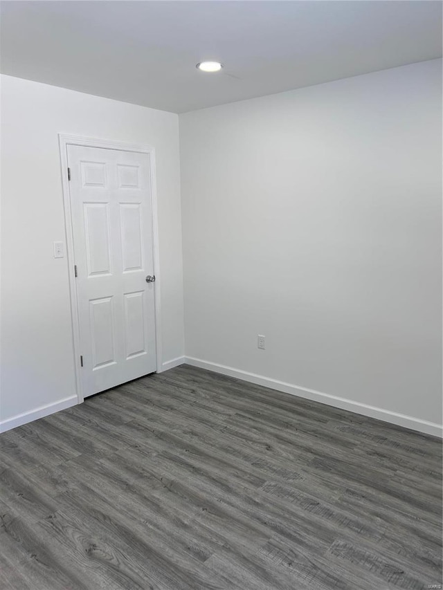 1510 N Mapleshade Rd, Cuba, MO 65453 - unfurnished room featuring baseboards, recessed lighting, and dark wood finished floors