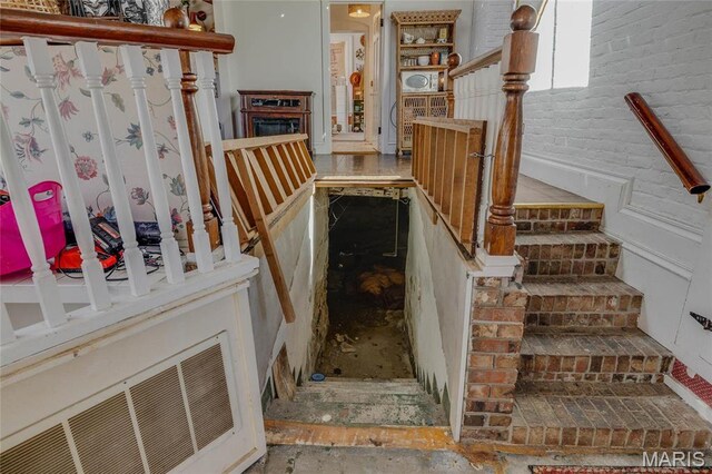 401 S Main, Fredericktown, MO 63645 - stairway featuring brick wall