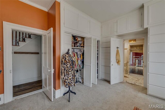 401 S Main, Fredericktown, MO 63645 - bedroom featuring light carpet, crown molding, a closet, and baseboards