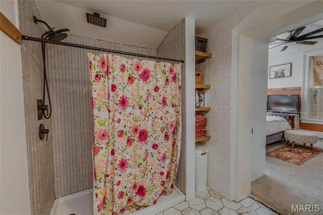 401 S Main, Fredericktown, MO 63645 - ensuite bathroom featuring a stall shower, ceiling fan, and tile patterned flooring