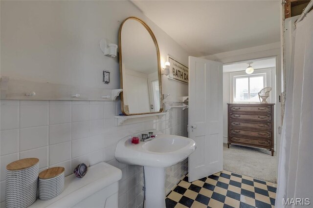 401 S Main, Fredericktown, MO 63645 - full bath with tile patterned floors, tile walls, and toilet