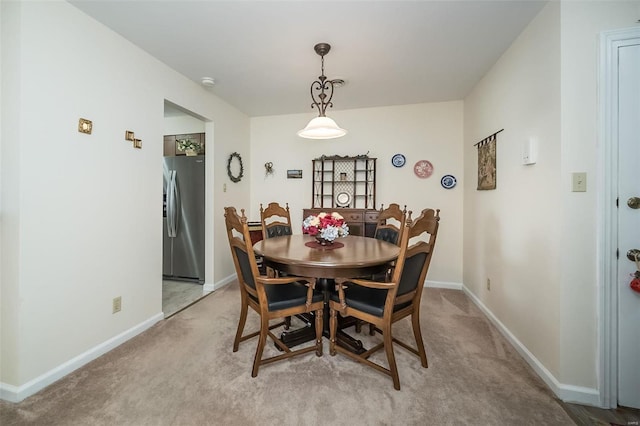 1611 Walpole Dr Unit C, Chesterfield, MO 63017 - dining area featuring baseboards and light carpet