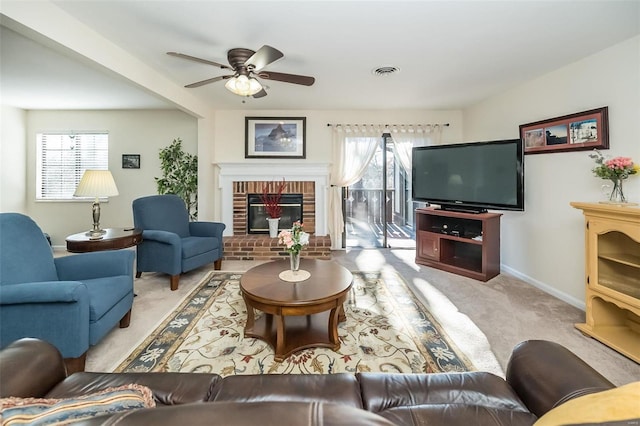 1611 Walpole Dr Unit C, Chesterfield, MO 63017 - carpeted living room featuring baseboards, a fireplace, and ceiling fan