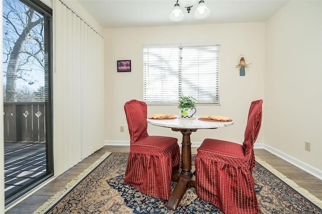 1611 Walpole Dr Unit C, Chesterfield, MO 63017 - dining room with wood finished floors, plenty of natural light, and baseboards