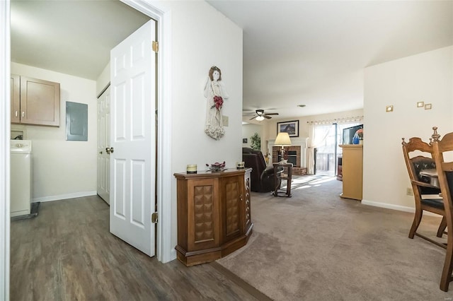 1611 Walpole Dr Unit C, Chesterfield, MO 63017 - corridor featuring washer / clothes dryer, electric panel, baseboards, and dark wood finished floors