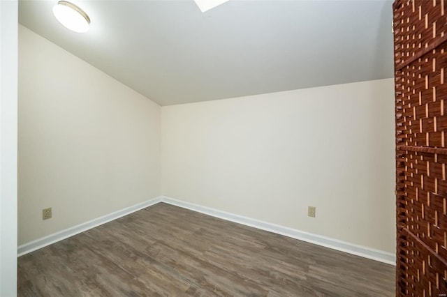 1611 Walpole Dr Unit C, Chesterfield, MO 63017 - bonus room featuring dark wood-style flooring, vaulted ceiling, and baseboards