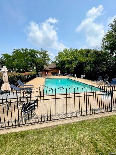 1611 Walpole Dr Unit C, Chesterfield, MO 63017 - community pool featuring a patio and fence