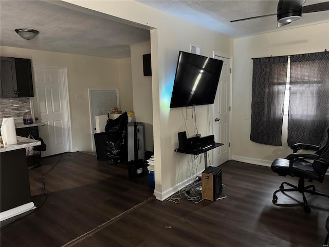 10533 Earl Dr, Saint Louis, MO 63136 - living room featuring dark wood-style floors, a textured ceiling, baseboards, and ceiling fan