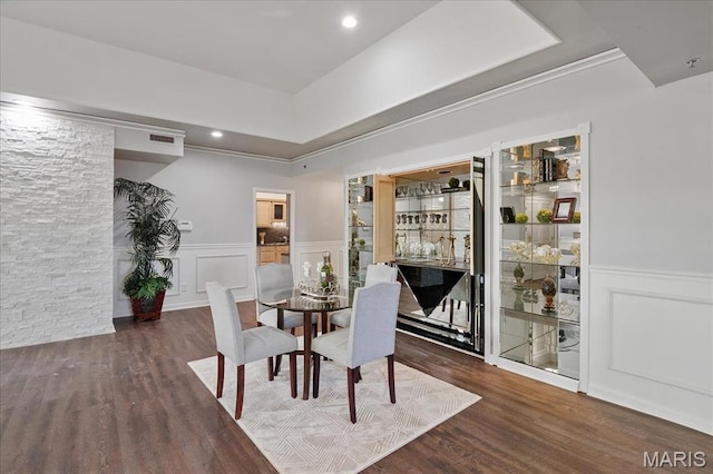 561 Sarah Ln Unit 305, Saint Louis, MO 63141 - dining area featuring wood finished floors, a dry bar, a wainscoted wall, a decorative wall, and recessed lighting