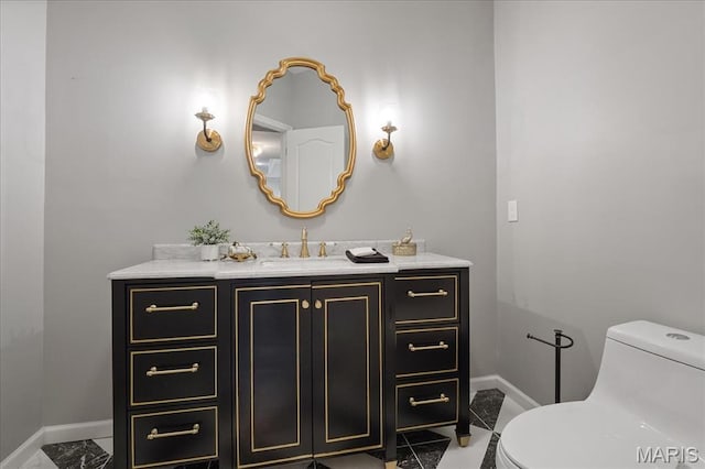 561 Sarah Ln Unit 305, Saint Louis, MO 63141 - bathroom featuring toilet, baseboards, and vanity