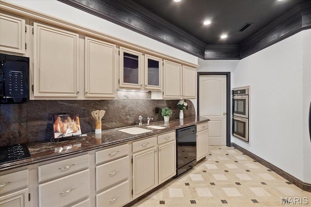 561 Sarah Ln Unit 305, Saint Louis, MO 63141 - kitchen featuring black appliances, baseboards, a sink, tasteful backsplash, and cream cabinetry