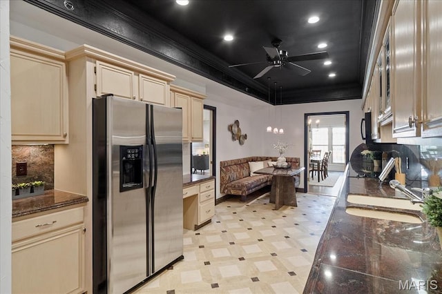 561 Sarah Ln Unit 305, Saint Louis, MO 63141 - kitchen featuring stainless steel fridge, crown molding, backsplash, a sink, and cream cabinetry