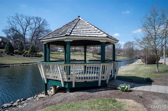 9167 Robin Ct, Saint Louis, MO 63144 - dock featuring a gazebo, a water view, and a lawn