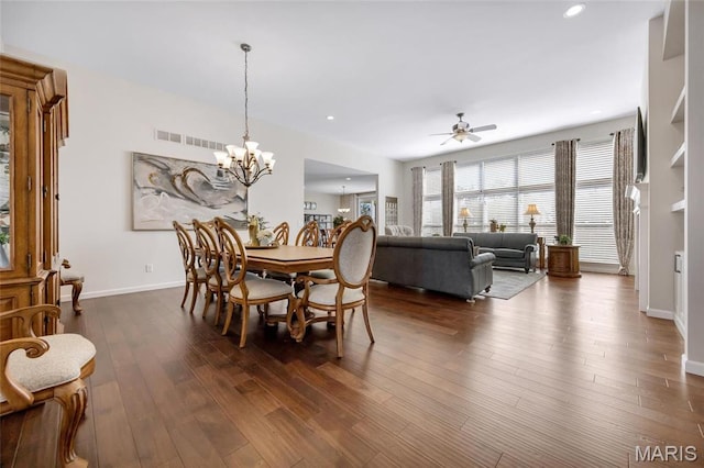 2 Wyndemere Ct, Lake St Louis, MO 63367 - dining area with a chandelier, dark wood-style flooring, ceiling fan, baseboards, and recessed lighting