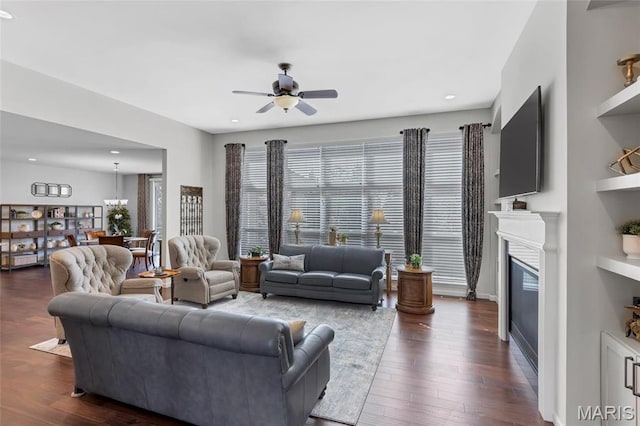 2 Wyndemere Ct, Lake St Louis, MO 63367 - living room with ceiling fan, dark wood finished floors, a glass covered fireplace, and recessed lighting