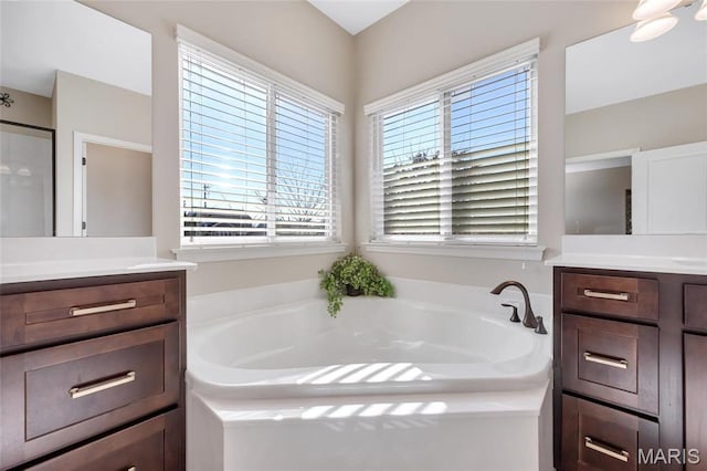 2 Wyndemere Ct, Lake St Louis, MO 63367 - full bathroom featuring vanity and a bath