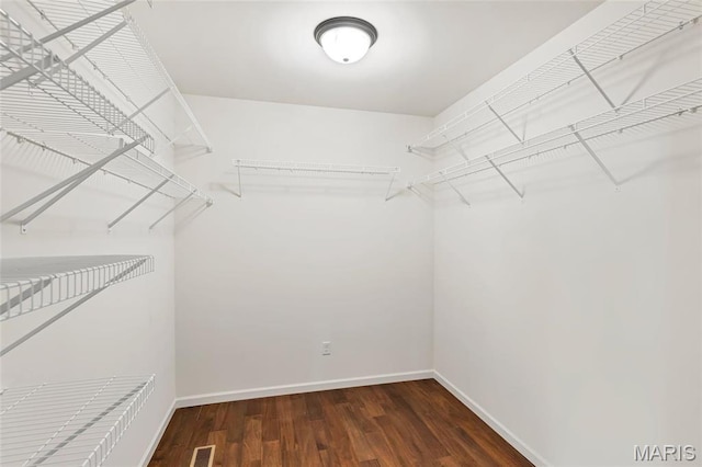2 Wyndemere Ct, Lake St Louis, MO 63367 - walk in closet featuring wood finished floors