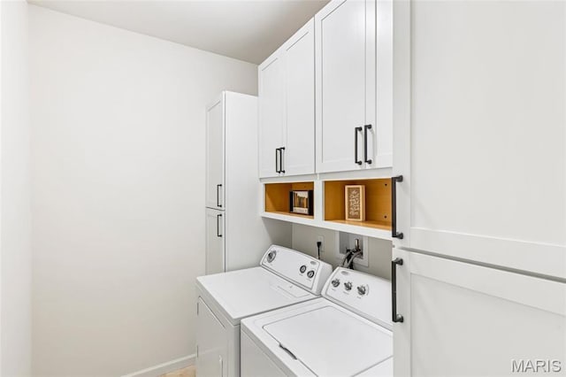 2 Wyndemere Ct, Lake St Louis, MO 63367 - laundry area with independent washer and dryer, cabinet space, and baseboards