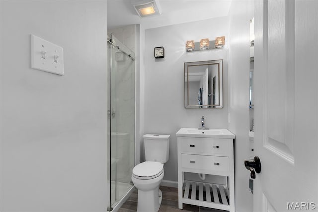944 Millwood Dr, Saint Peters, MO 63376 - full bath with toilet, a stall shower, vanity, baseboards, and wood finished floors