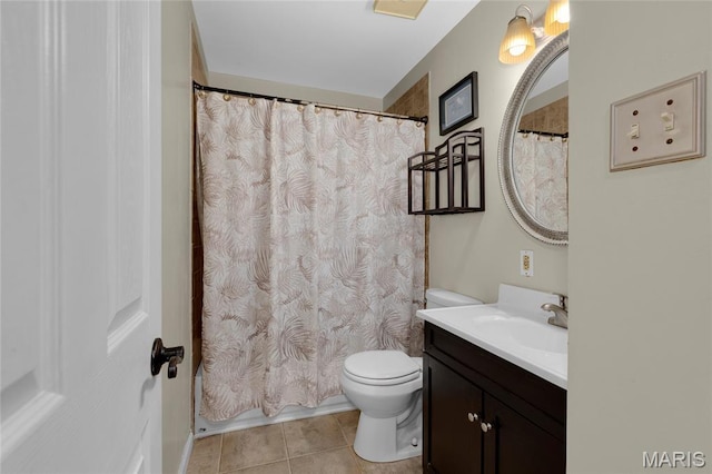 944 Millwood Dr, Saint Peters, MO 63376 - full bathroom featuring vanity, toilet, tile patterned floors, and a shower with curtain