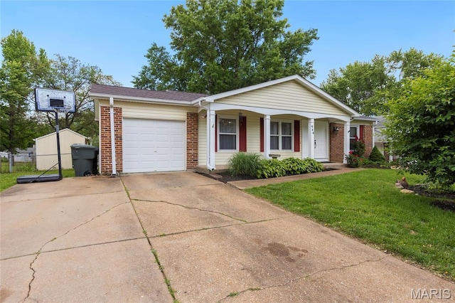 944 Millwood Dr, Saint Peters, MO 63376 - ranch-style home with brick siding, covered porch, an attached garage, and driveway