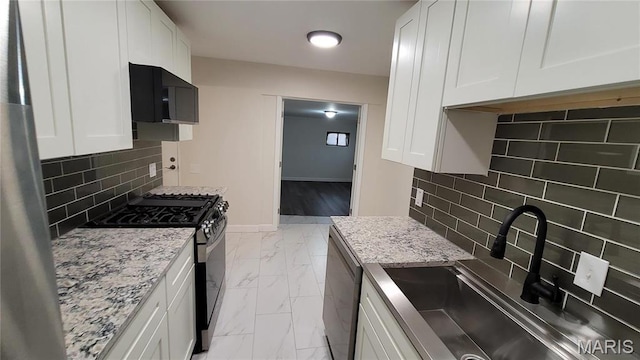10216 Pannell Dr, Saint Louis, MO 63136 - kitchen featuring black appliances, a sink, light stone counters, and white cabinetry