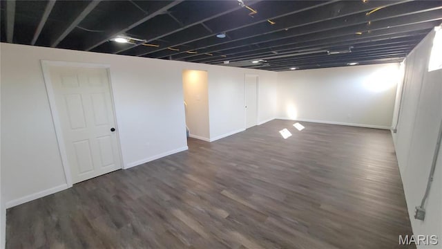 10216 Pannell Dr, Saint Louis, MO 63136 - finished below grade area featuring wood finished floors and baseboards