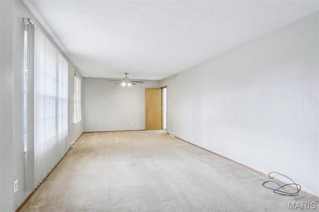 29 Zinnia Dr, Belleville, IL 62221 - empty room with ceiling fan, light colored carpet, and baseboards