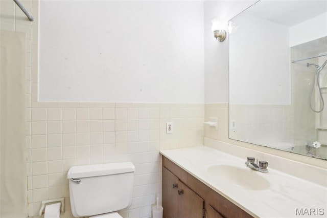 29 Zinnia Dr, Belleville, IL 62221 - bathroom with a shower, tile walls, vanity, toilet, and a wainscoted wall