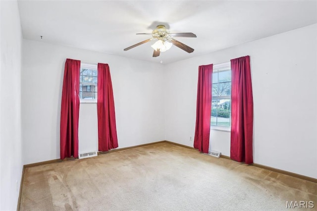 29 Zinnia Dr, Belleville, IL 62221 - unfurnished room with carpet floors, a ceiling fan, and baseboards