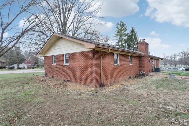 29 Zinnia Dr, Belleville, IL 62221 - view of property exterior featuring a chimney and brick siding