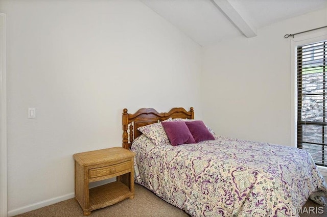 bedroom featuring light colored carpet and baseboards