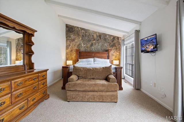 bedroom with carpet floors and baseboards