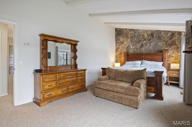 bedroom featuring carpet, beamed ceiling, and baseboards